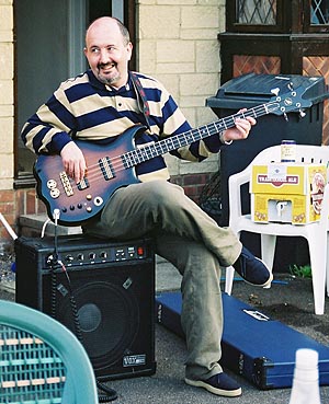 Chris on bass, Jubilee street party 2002